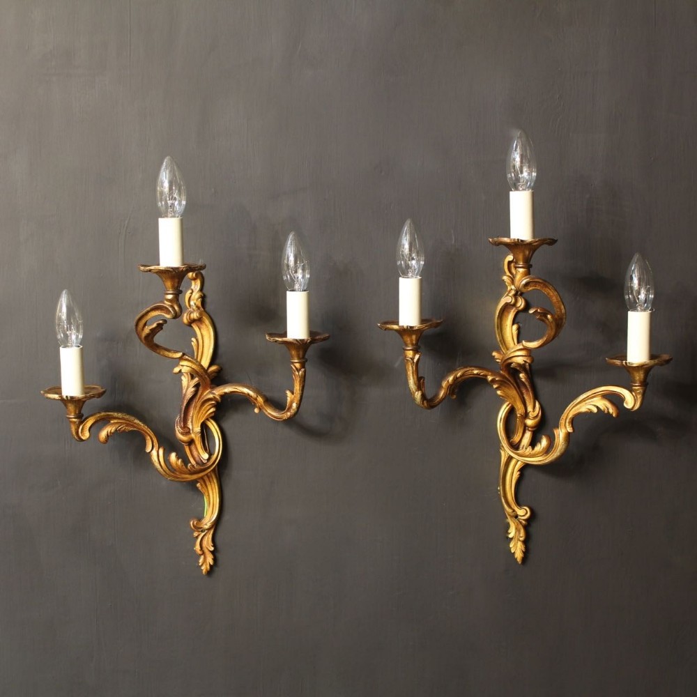 A French Pair Of Gilded Antique Wall Lights