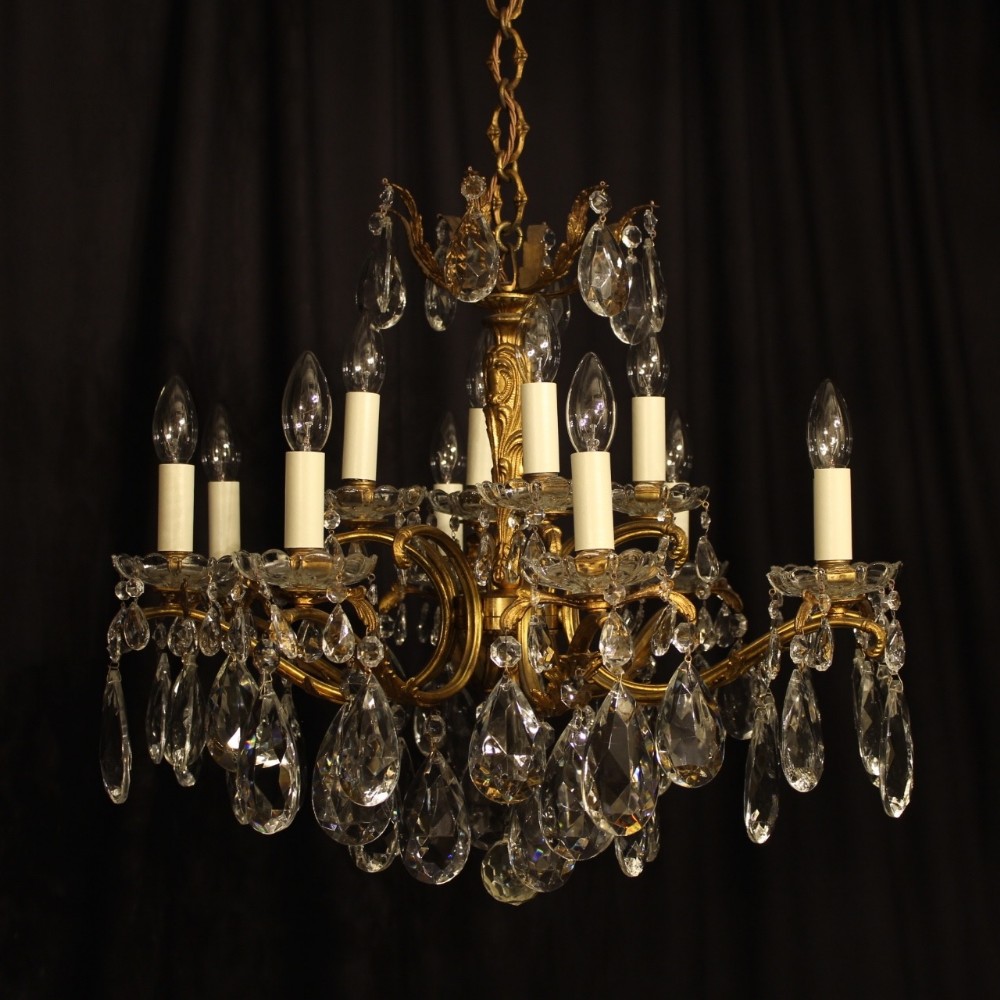An Italian 12 Light Gilded Antique Chandelier
