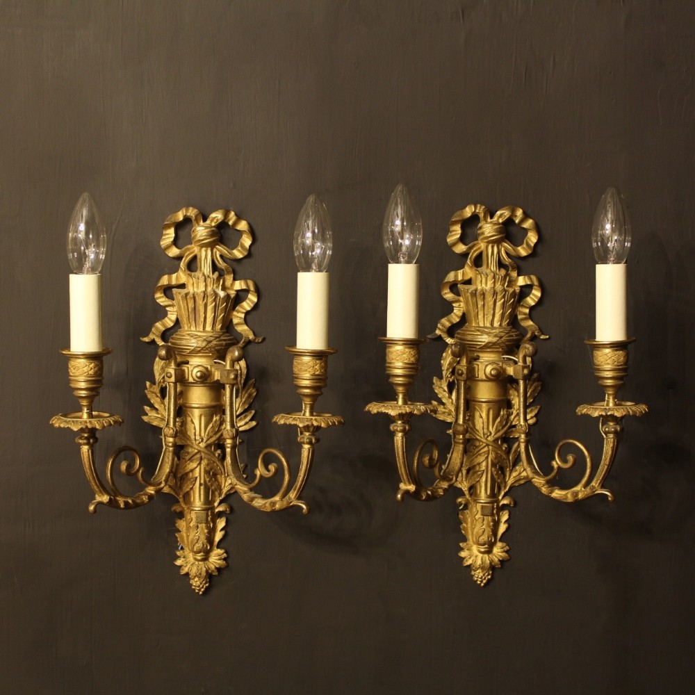 A French Pair Of Bronze Antique Wall Sconces