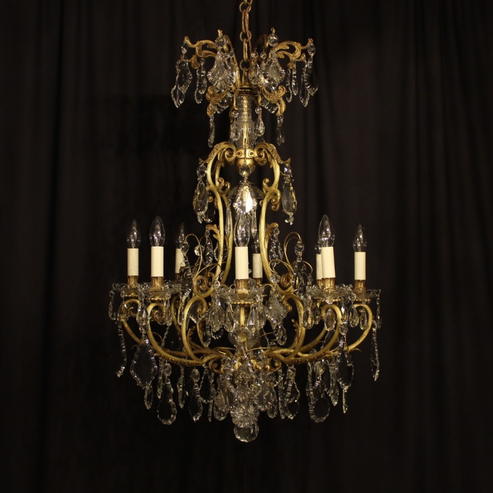 A French Gilded Bronze & Crystal 9 Light Antique Chandelier