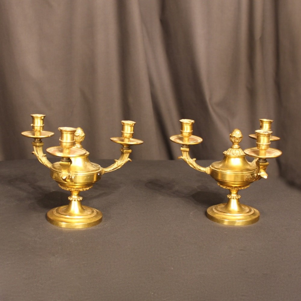 A French Pair Of Gilded Bronze Candelabra