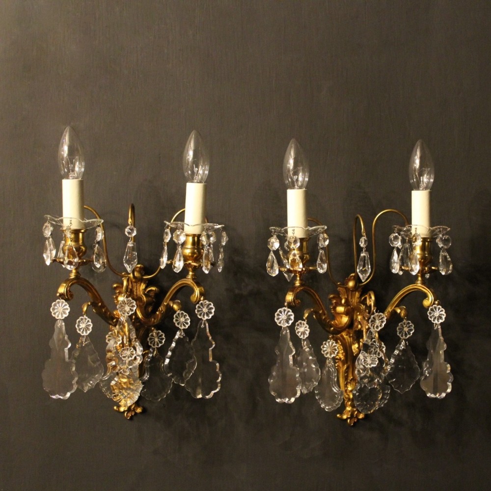 A French Pair Of Bronze Antique Wall Lights