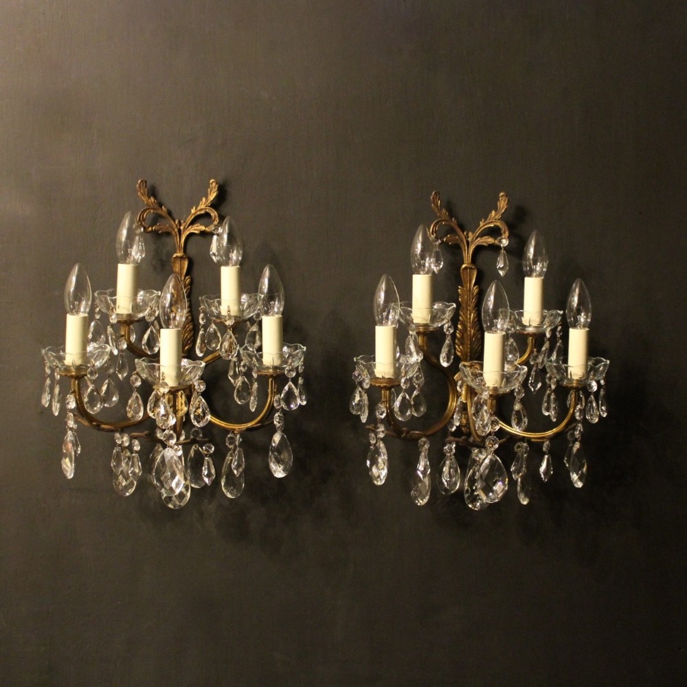 An Italian Pair Of Gilded Antique Wall Lights
