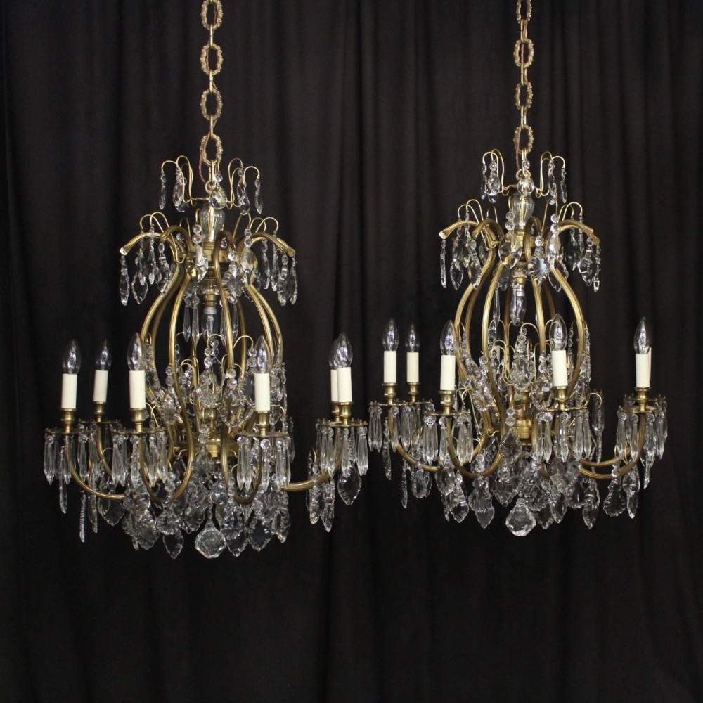 A French Pair Of Gilded 13 Light Cage Form Chandeliers