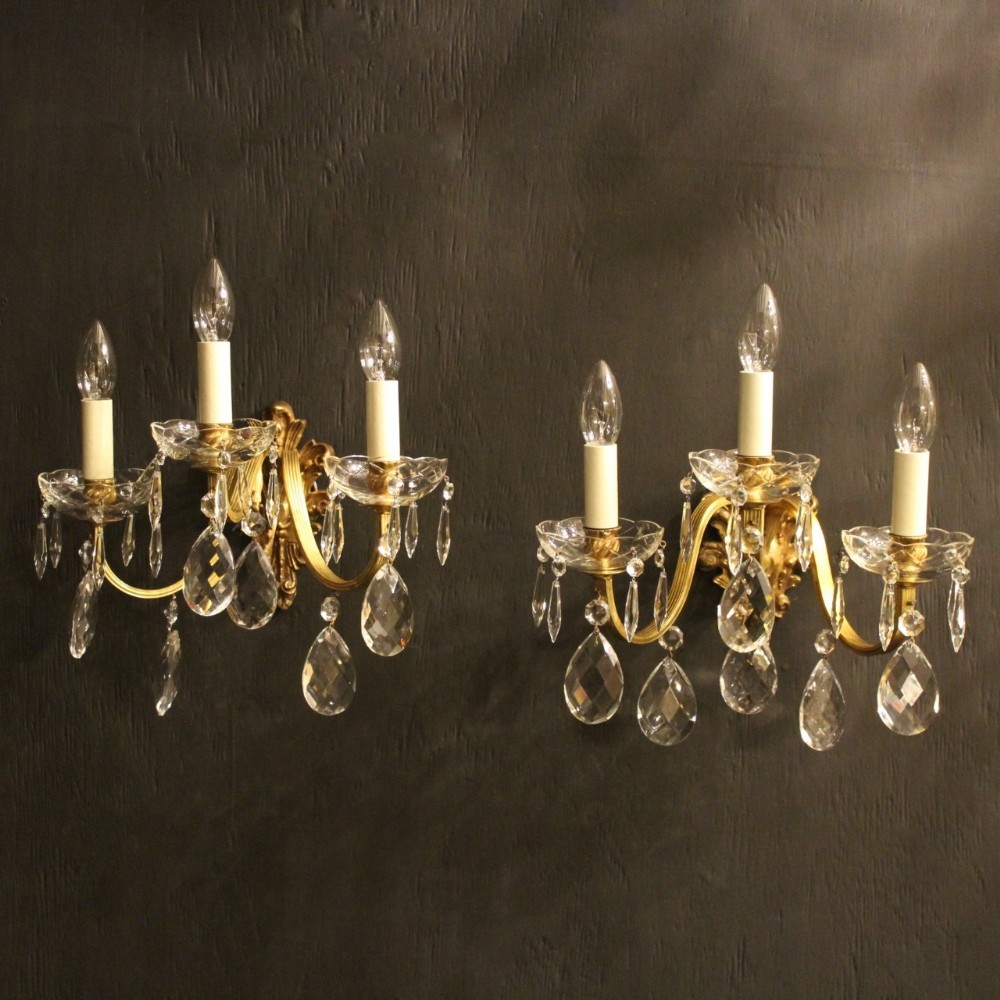 An Italian Pair Of Gilded Antique Wall Lights
