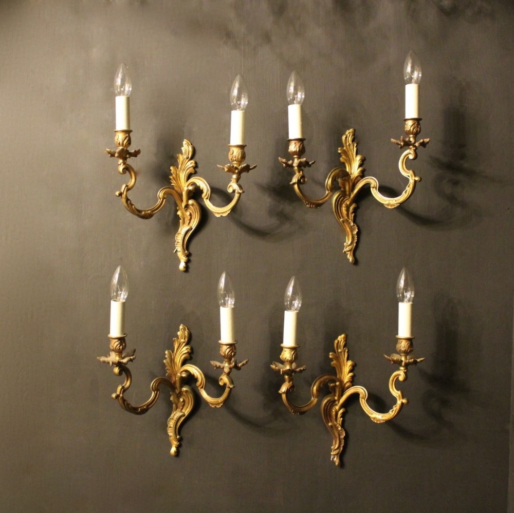 A French Set Of 4 Gilded Twin Arm Antique Wall Lights