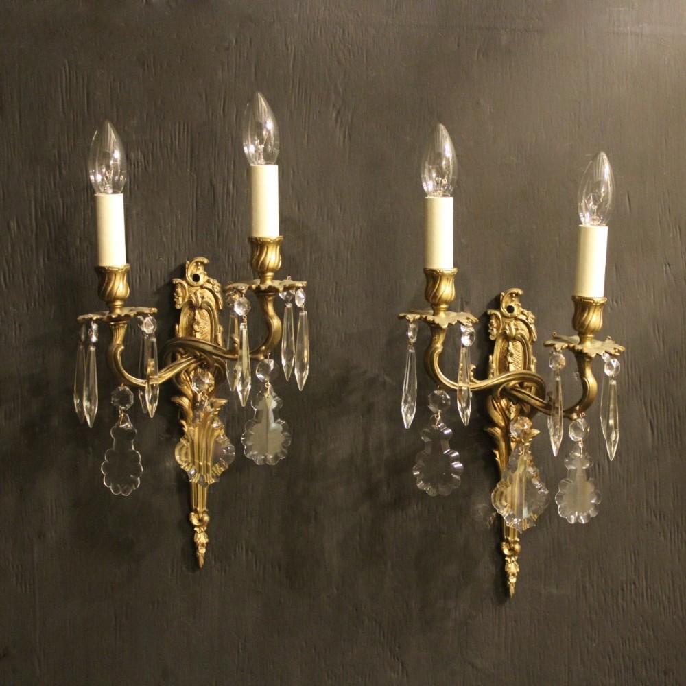 A French Pair Of Bronze Antique Wall Sconces