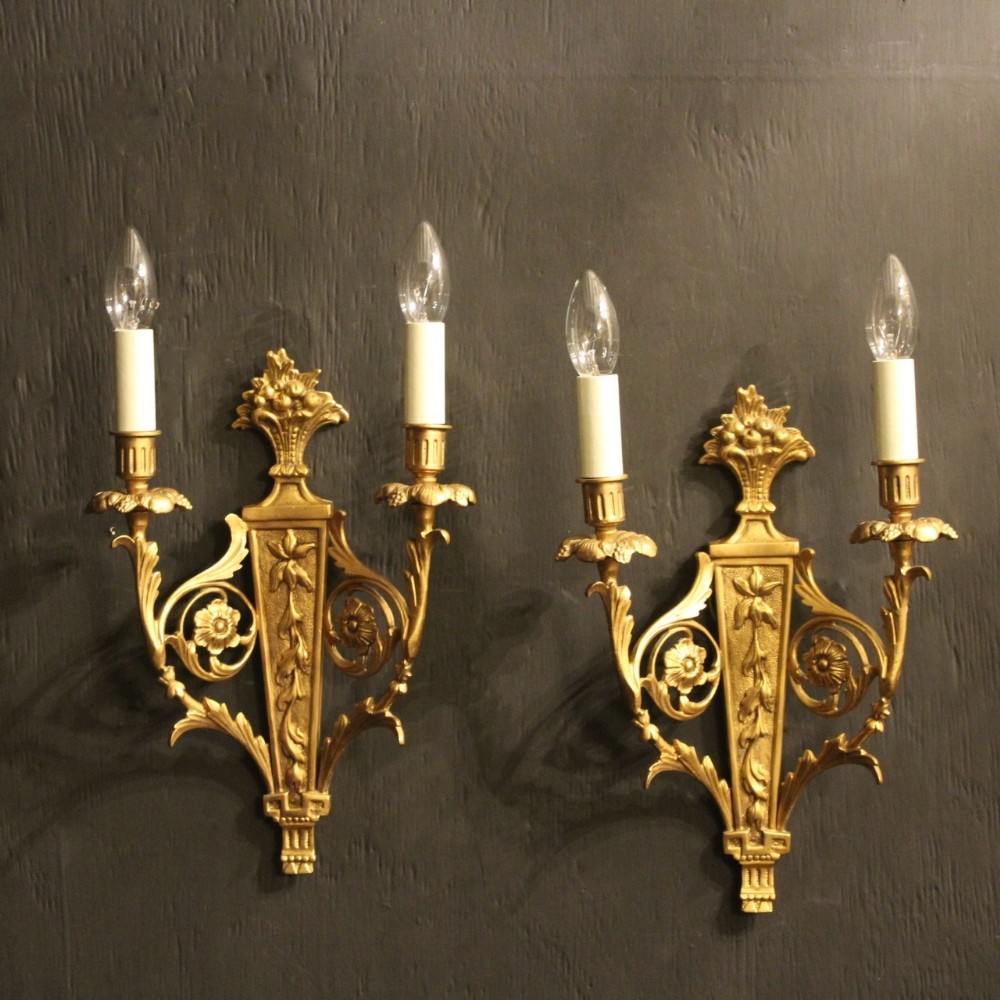 A French Pair Of Gilded Twin Arm Wall Lights