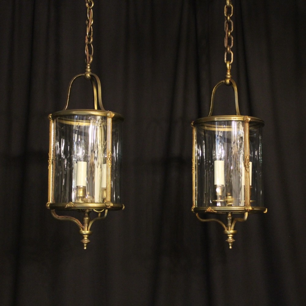 A French Pair Of Gilded Triple Light Lanterns