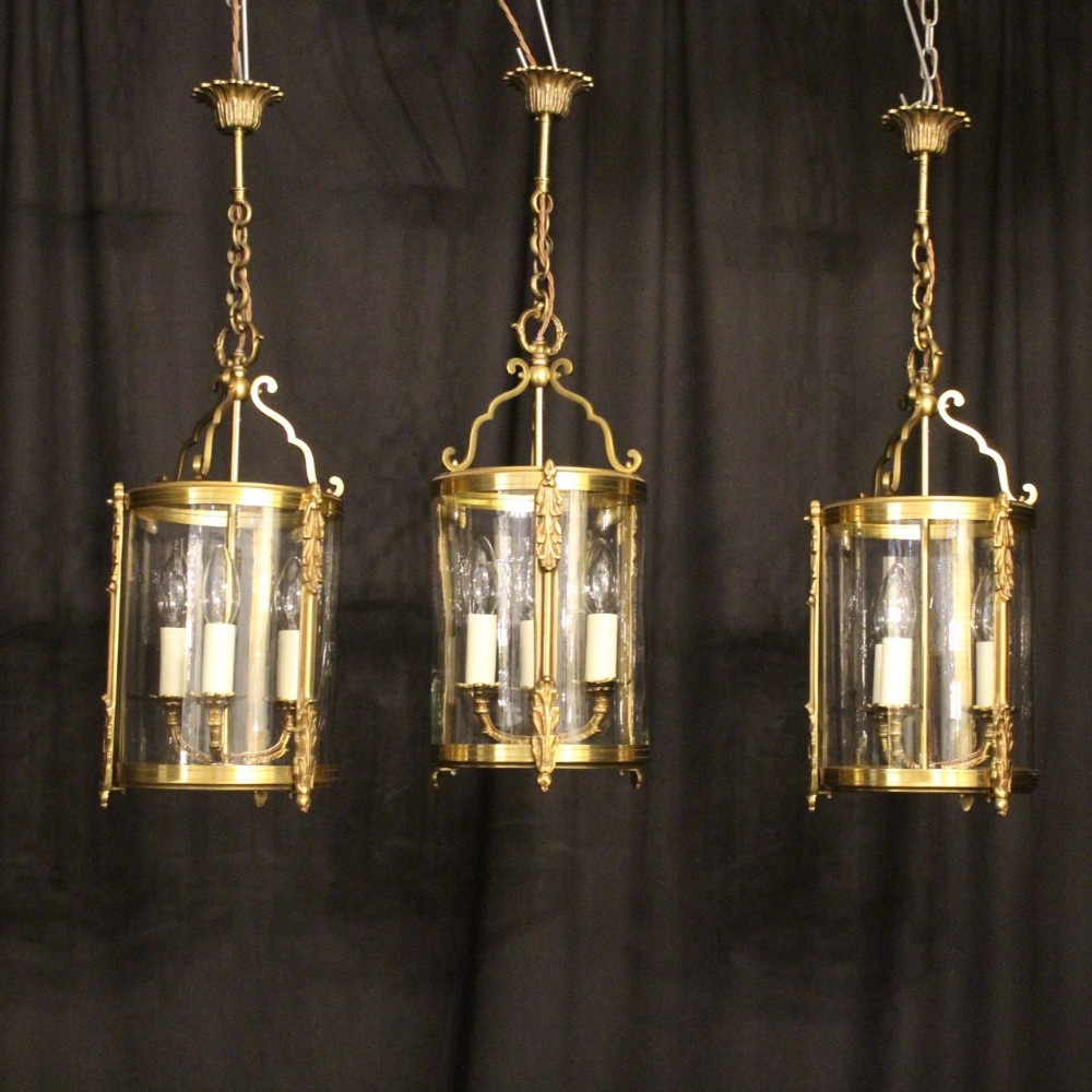 A French Set Of Three Gilded Hall Lantern