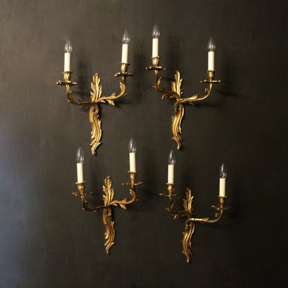 A French Set Of 4 Gilded Twin Arm Antique Wall Lights
