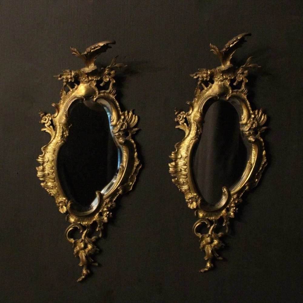 A French Pair Of Bronze Antique Mirrors