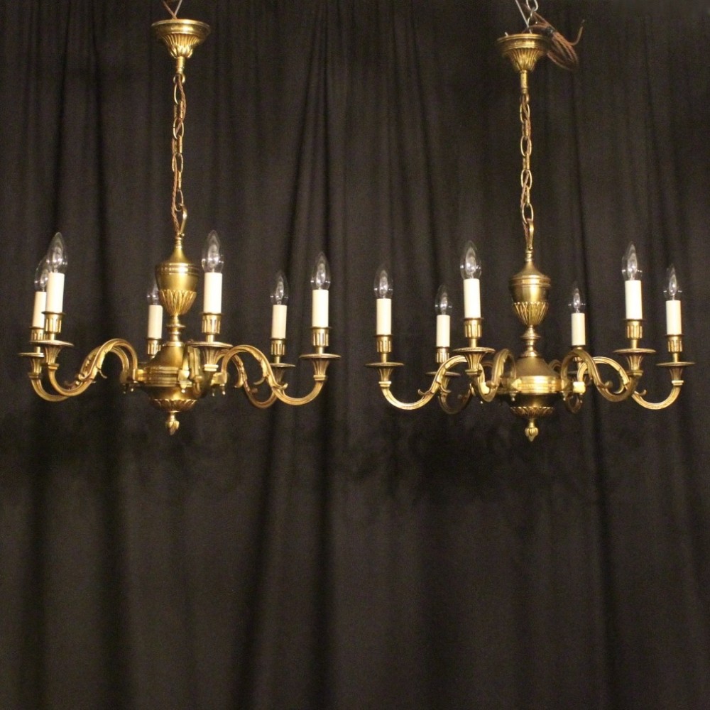 A French Pair Of Gilded 6 Light Chandeliers