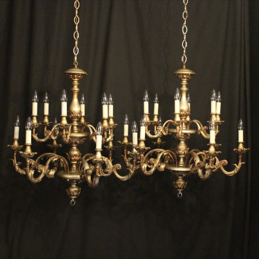 Florentine Pair Of 12 Light Double Tiered Polychrome Chandeliers