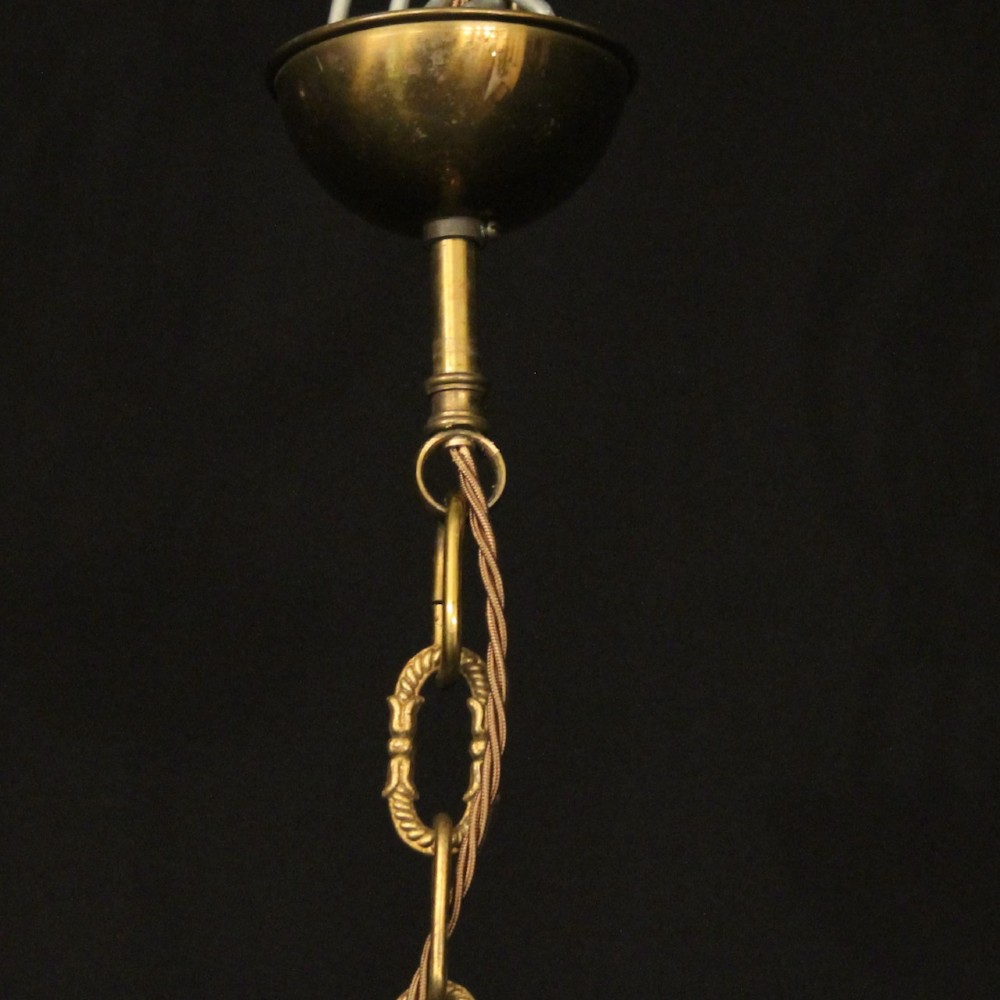 A cylindrical gilded brass hall lantern featuring curved convex glass panels and an internal four-light cluster. View X