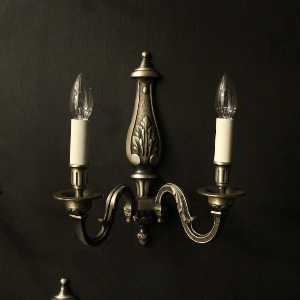 A set of six French twin-branch wall lights crafted from silver gilded metal with central acanthus backplates. View II