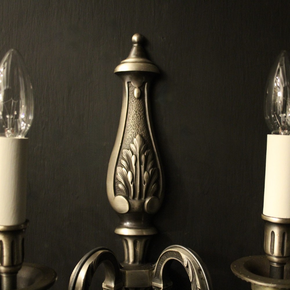 A set of six French twin-branch wall lights crafted from silver gilded metal with central acanthus backplates. View III