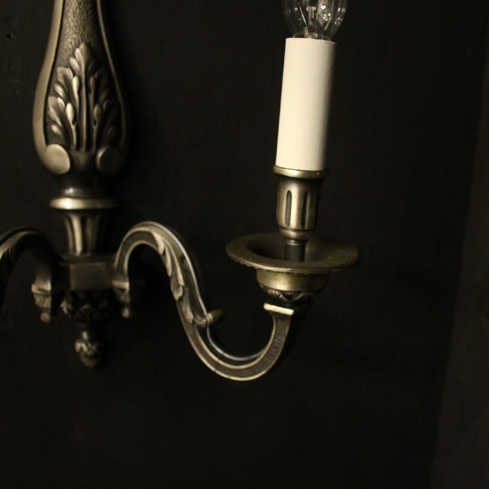 A set of six French twin-branch wall lights crafted from silver gilded metal with central acanthus backplates. View V