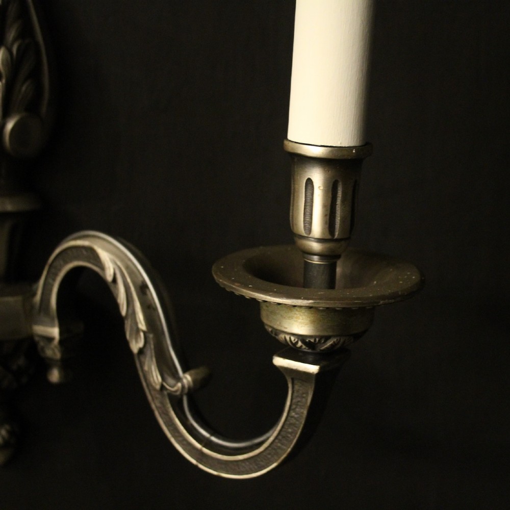 A set of six French twin-branch wall lights crafted from silver gilded metal with central acanthus backplates. View VI