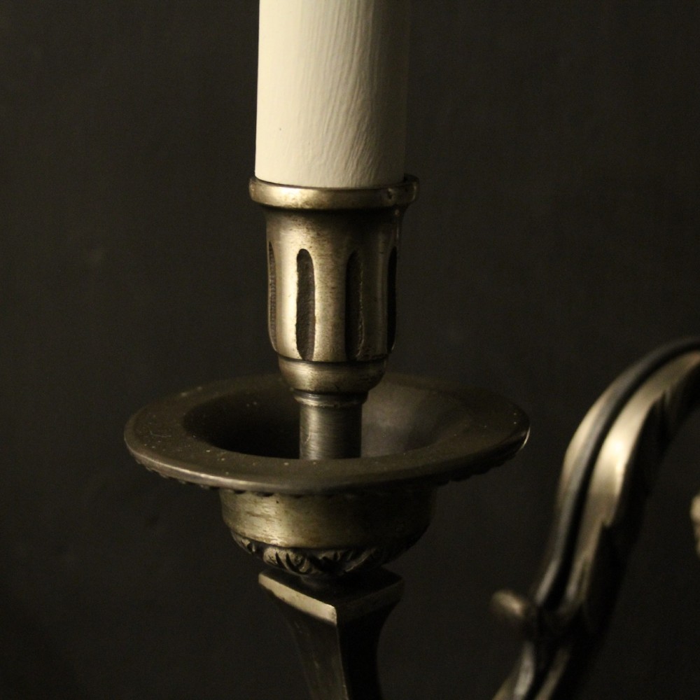 A set of six French twin-branch wall lights crafted from silver gilded metal with central acanthus backplates. View VII