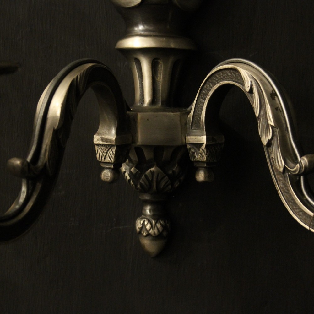 A set of six French twin-branch wall lights crafted from silver gilded metal with central acanthus backplates. View VIII
