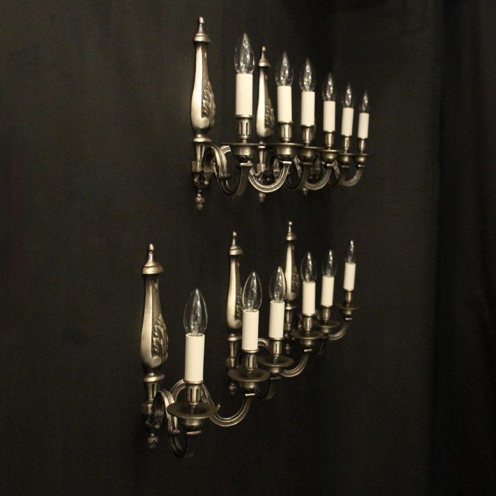 A set of six French twin-branch wall lights crafted from silver gilded metal with central acanthus backplates. View X