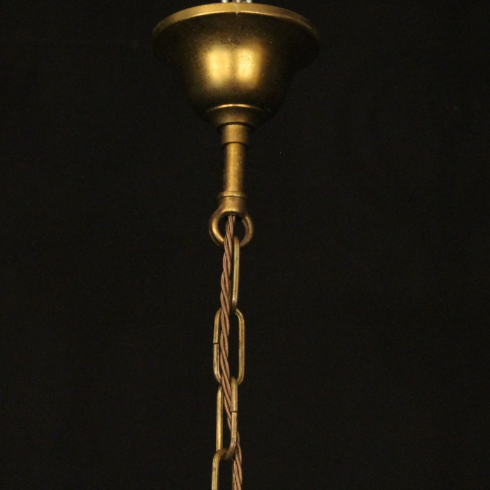 A cylindrical antique French hall lantern crafted from gilded brass with clear glass panels housing a three-light candle cluster. View X