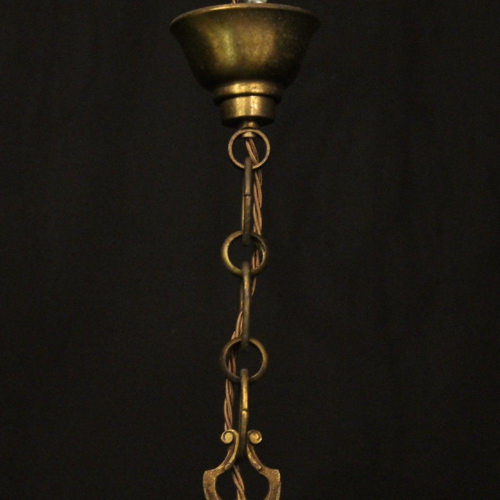 An antique French cylindrical hall lantern featuring a gilded brass frame, curved glass panels, and a three-light interior fitting suspended from a hook. View X