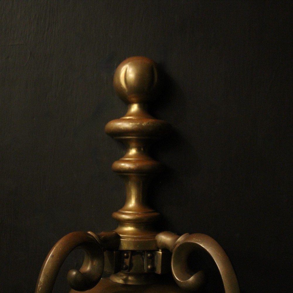 A set of three antique bronze wall sconces, each featuring a turned central baluster and two scrolled arms holding candle-style bulb holders. View VI