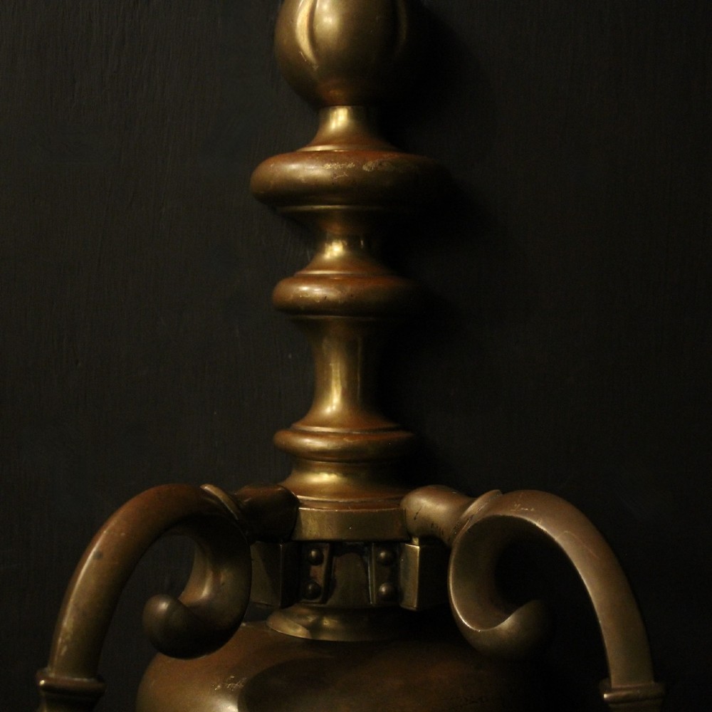 A set of three antique bronze wall sconces, each featuring a turned central baluster and two scrolled arms holding candle-style bulb holders. View VIII