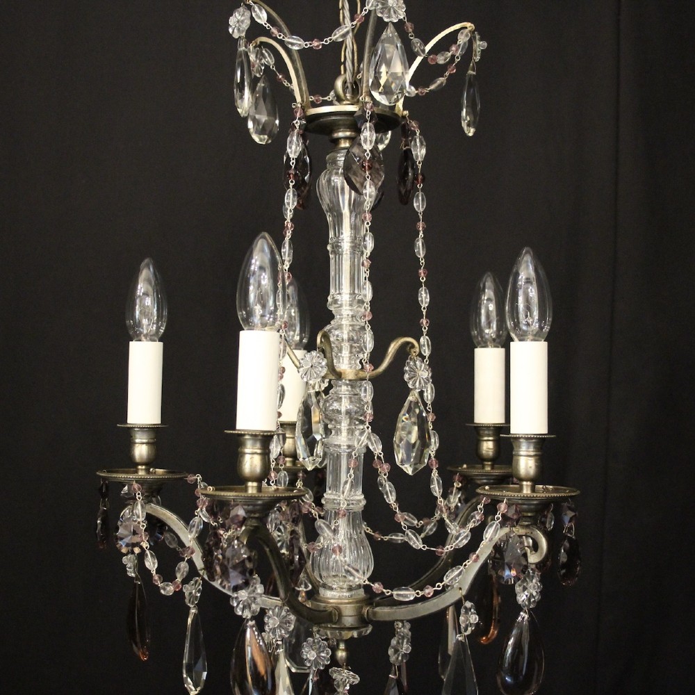An antique French silver gilt five-light chandelier with clear and tinted crystal teardrop pendants, bead strands, and candle-style bulb sockets. View III