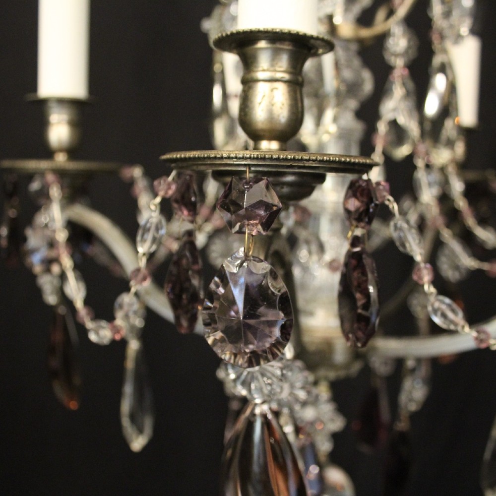 An antique French silver gilt five-light chandelier with clear and tinted crystal teardrop pendants, bead strands, and candle-style bulb sockets. View VII