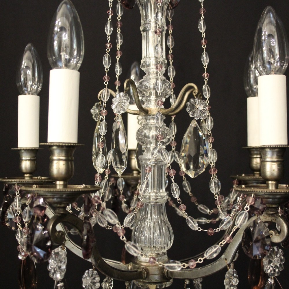 An antique French silver gilt five-light chandelier with clear and tinted crystal teardrop pendants, bead strands, and candle-style bulb sockets. View VIII