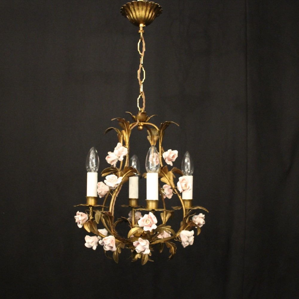 A four-light French toleware chandelier featuring gilded metal leaf branches adorned with small pink porcelain rose blossoms. View II