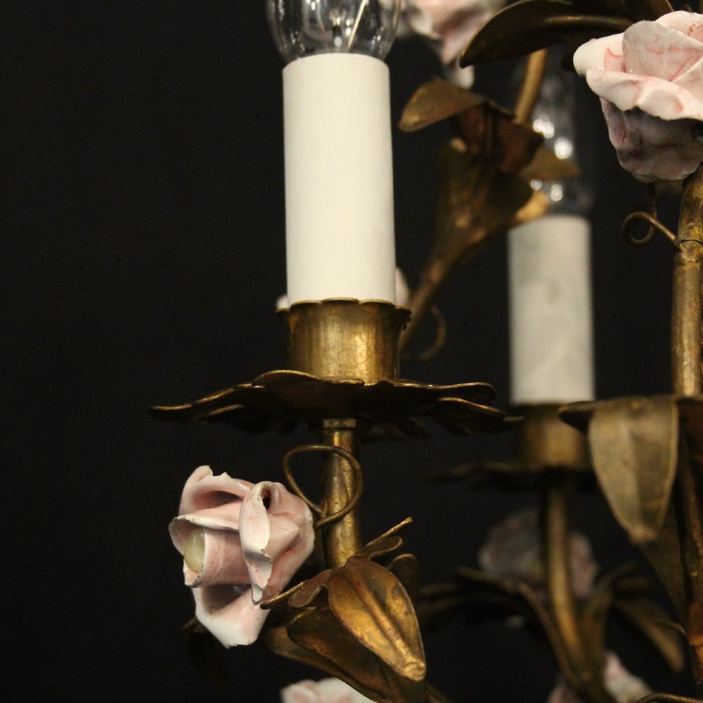 A four-light French toleware chandelier featuring gilded metal leaf branches adorned with small pink porcelain rose blossoms. View VI