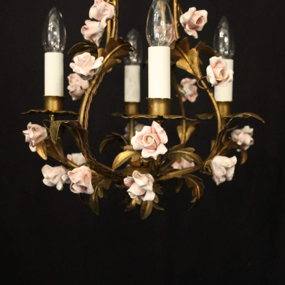 A four-light French toleware chandelier featuring gilded metal leaf branches adorned with small pink porcelain rose blossoms. View VII