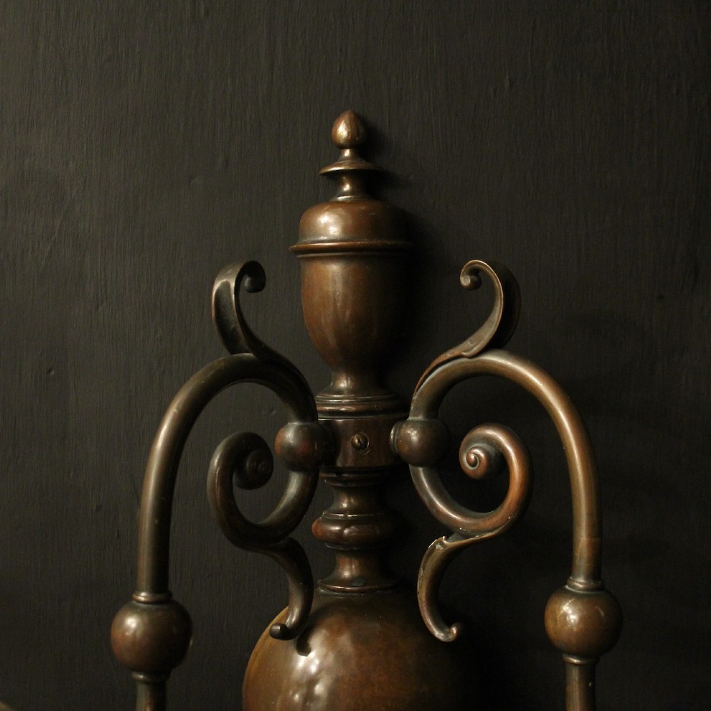 A pair of dark bronze twin-arm wall sconces featuring turned central shafts, scrollwork accents, and candle-style fittings. View IV