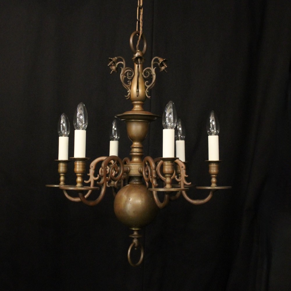 A pair of dark bronze six-light chandeliers featuring central turned baluster stems, lower spherical drops, and scrolling candle arms. View II