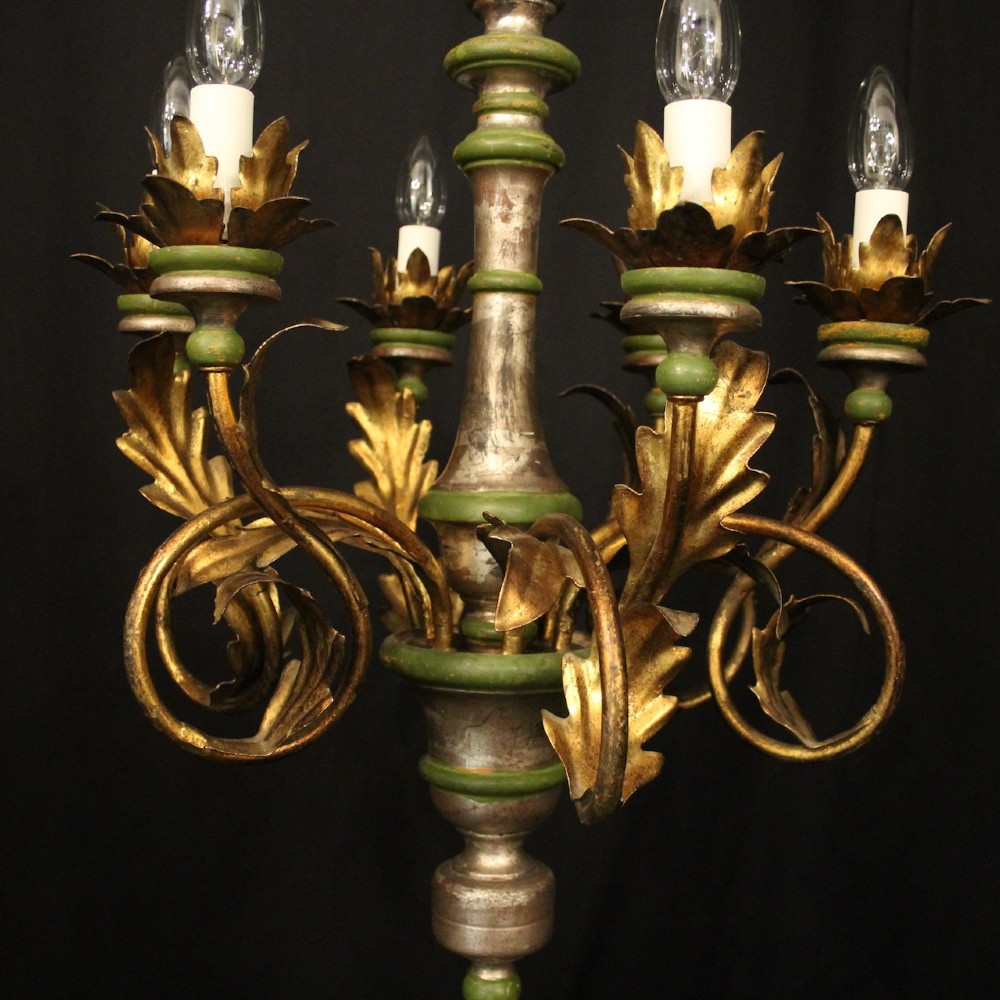 A Florentine six-arm giltwood chandelier featuring hand-carved acanthus leaves, turned central column, green painted accents, and distressed gold leaf finish. View III