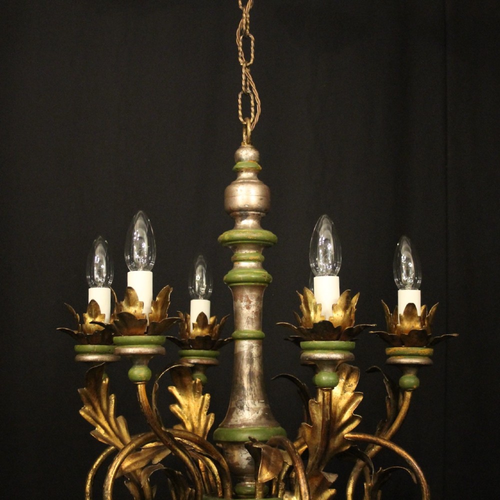 A Florentine six-arm giltwood chandelier featuring hand-carved acanthus leaves, turned central column, green painted accents, and distressed gold leaf finish. View IV