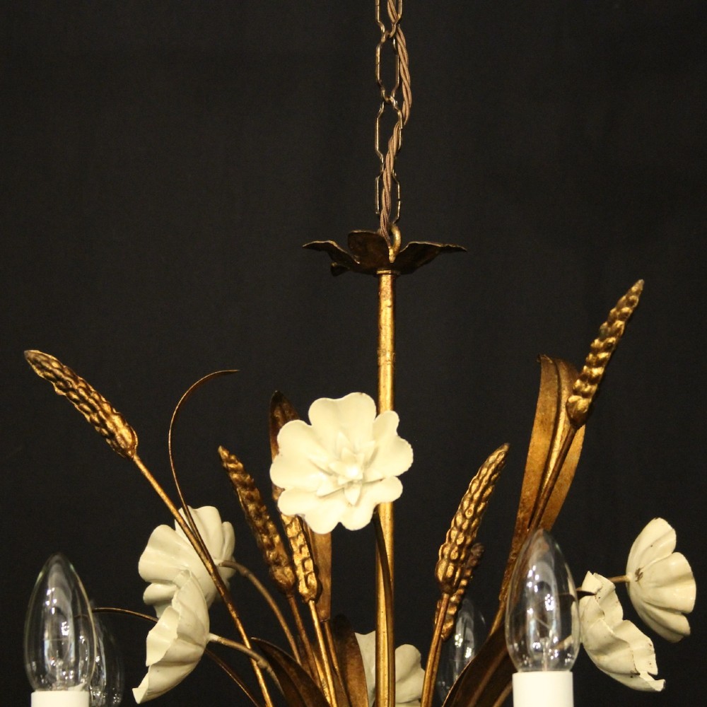 A French five-light gilded metal chandelier featuring a central wheatsheaf motif with cream painted flowers and candle-style bulb sockets. View VII