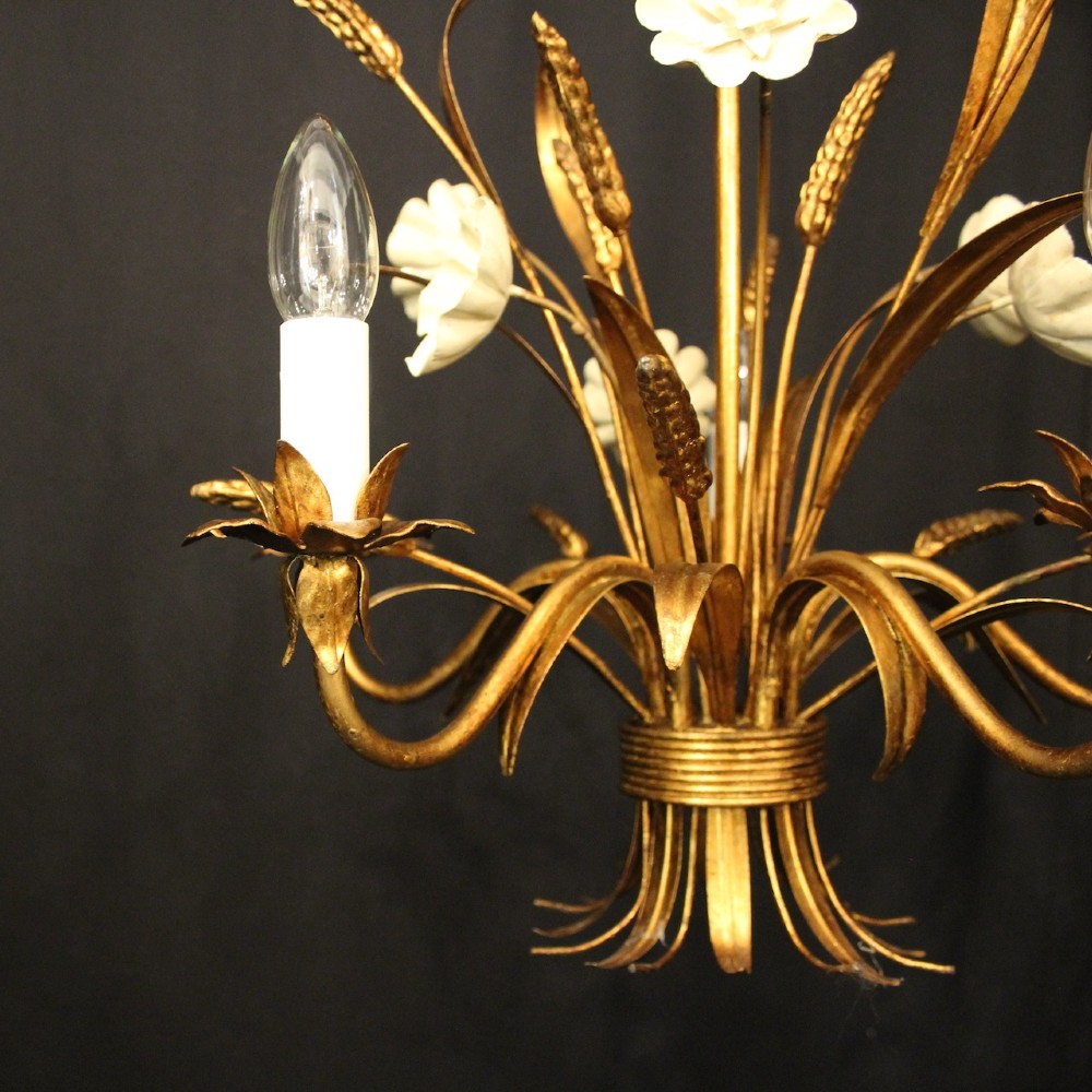 A French five-light gilded metal chandelier featuring a central wheatsheaf motif with cream painted flowers and candle-style bulb sockets. View IX