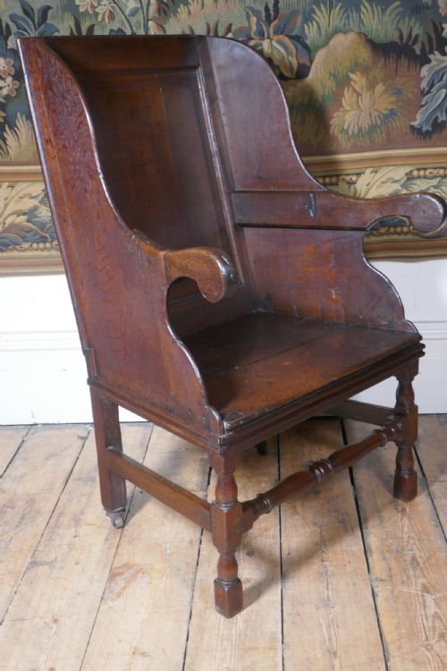 A GEORGIAN OAK WING BACK ARMCHAIR - ADDITIONAL PHOTO 1