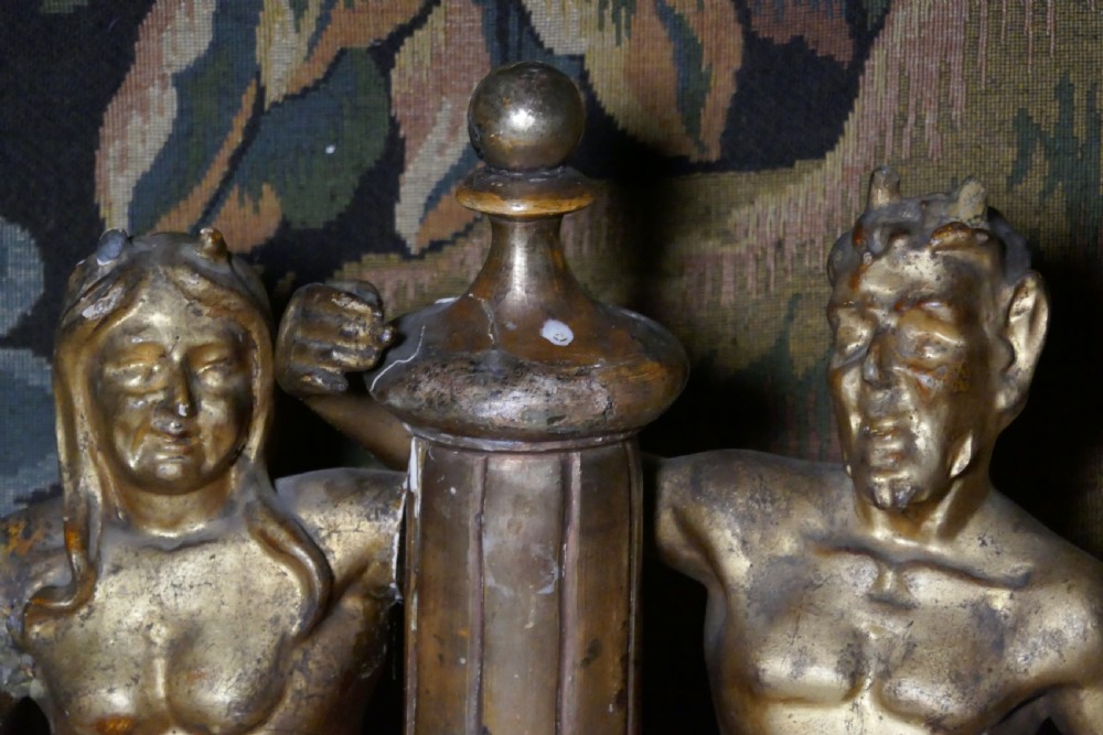 An 18th-century gilded carving featuring a central fluted column flanked by two seated mythological figures on an octagonal base. View IV