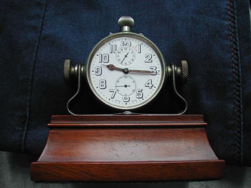 zenith large ww1 alarm pocket watch mounted on a land sea air bracket on a mahogany stand - CATEGORY: ANTIQUE CLOCKS - DATED 1910