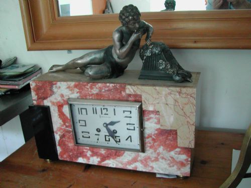 art deco marble clock mounted with pan playing pipes to a dove of peace - CATEGORY: ANTIQUE CLOCKS - DATED 1940