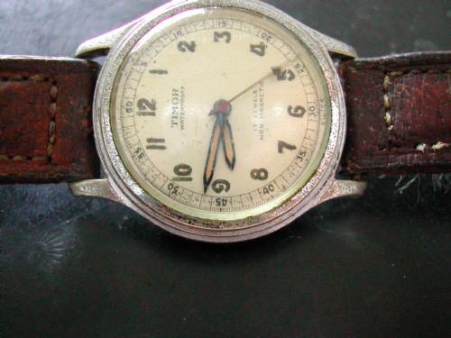 FOR SALE IS THIS QUITE RARE WW2 TIMOR WATERPROOF 17 JEWEL PILOTS OR NAVIGATORS WATCH CIRCA 1943 - ADDITIONAL PHOTO 11