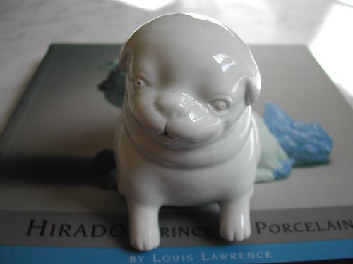 A GOOD HIRADO WATER DROPPER MODELLED AS A SEATED PUPPY MEIJI PERIOD - ADDITIONAL PHOTO 1