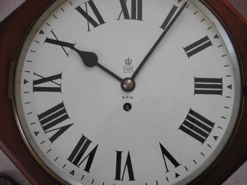 A MAGNIFICENT OCTAGONAL MAHOGANY CASED QUEEN ELIZABETH 11 ROYAL CYPHER POST OFFICE CLOCK NO EFW 531 AND 25513 DATED 1953 BY F W ELLIOTT - ADDITIONAL PHOTO 1
