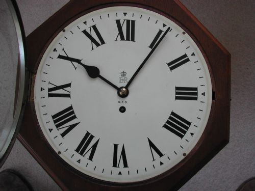 A MAGNIFICENT OCTAGONAL MAHOGANY CASED QUEEN ELIZABETH 11 ROYAL CYPHER POST OFFICE CLOCK NO EFW 531 AND 25513 DATED 1953 BY F W ELLIOTT - ADDITIONAL PHOTO 3